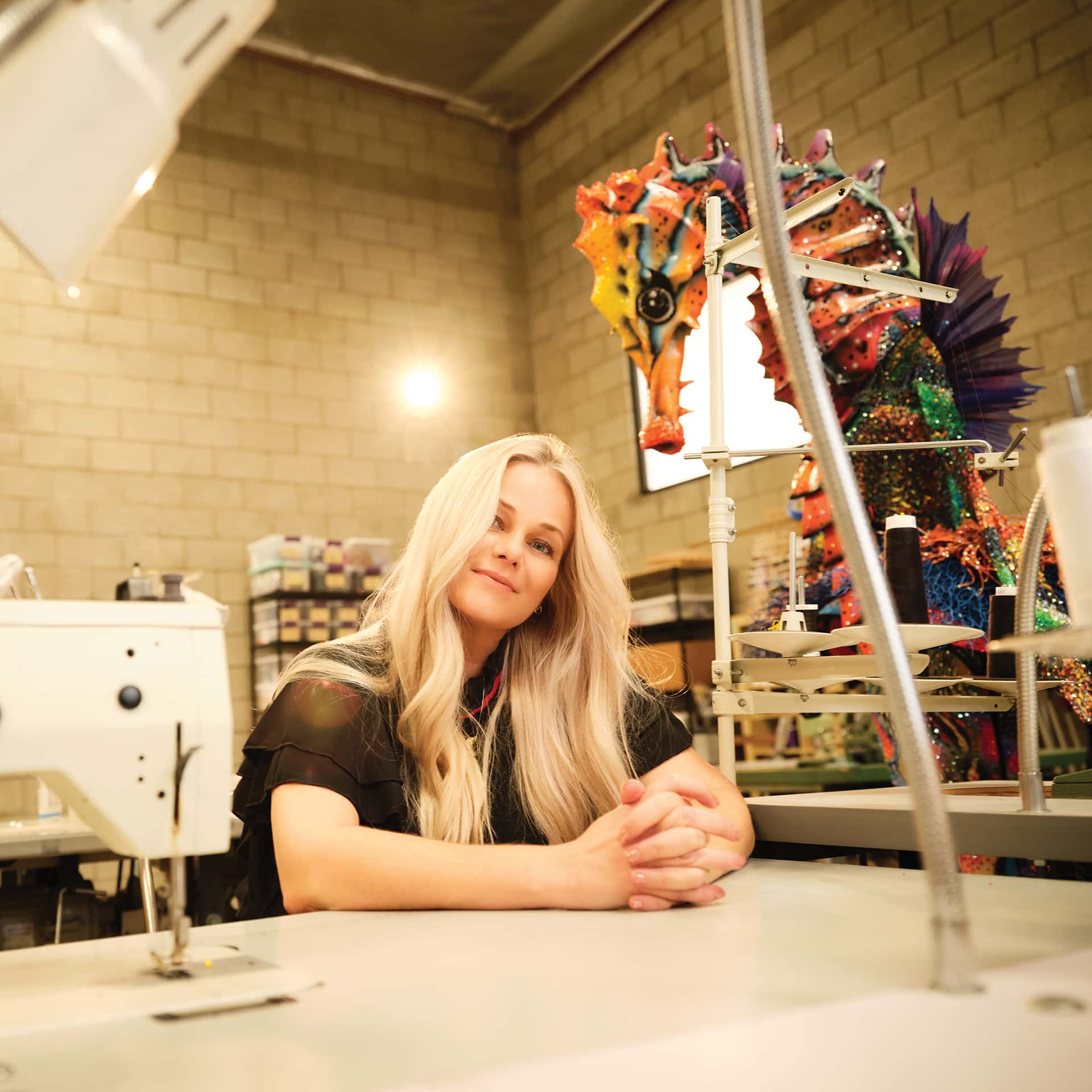 <p>Marina at her Glendale studio with the Seahorse costume (worn on the show by singer Tori Kelly) in the background.</p>
